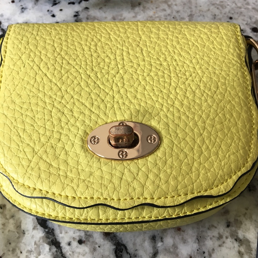 Adorable yellow purse.